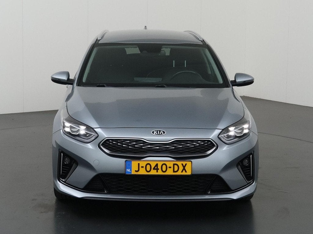 Kia Ceed Sportswagon 1.6 GDI PHEV DynamicPlusLine | Trekhaak, Auto's, Gebruikt, Leder en Stof, 1508 kg, Zilver of Grijs