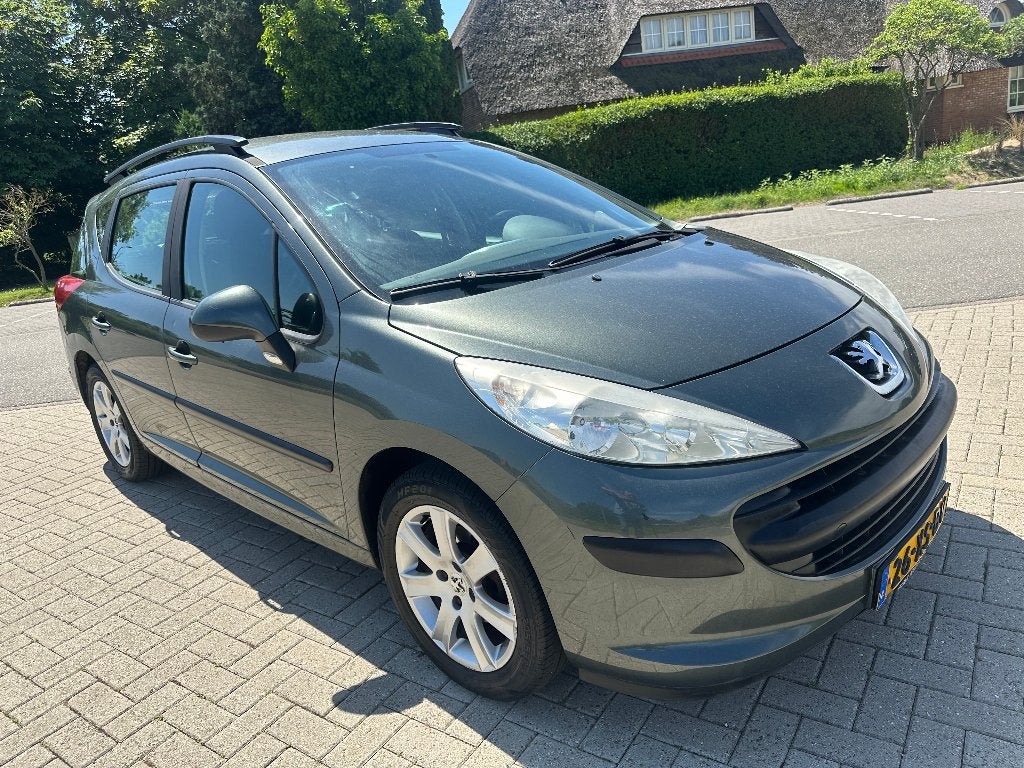Nette Peugeot 207 1.4 SW Stationcar 1 Jaar APK, Voorwielaandrijving, 1360 cc, Zwart, 4 cilinders