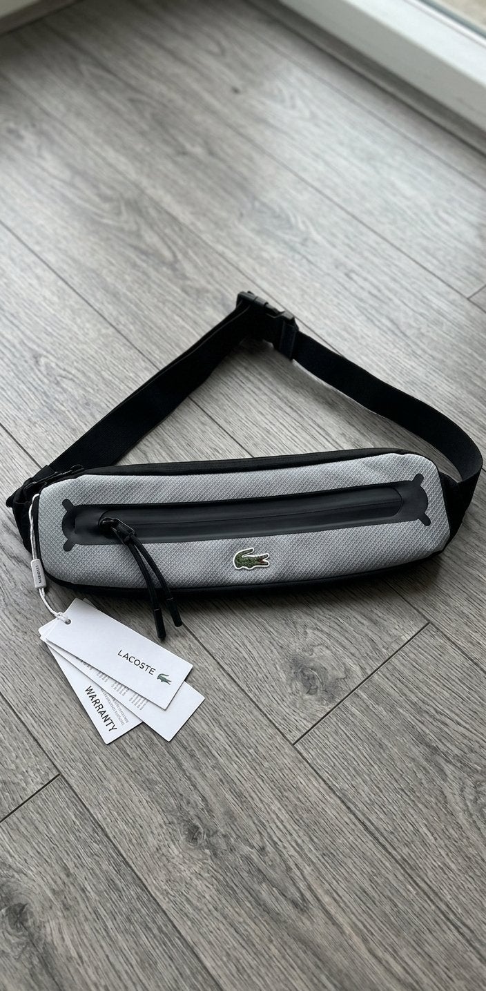 Lacoste Waistbag / Heuptas Origineel Nieuw met kaartjes, Ophalen of Verzenden, Nieuw, Zwart, Overige merken