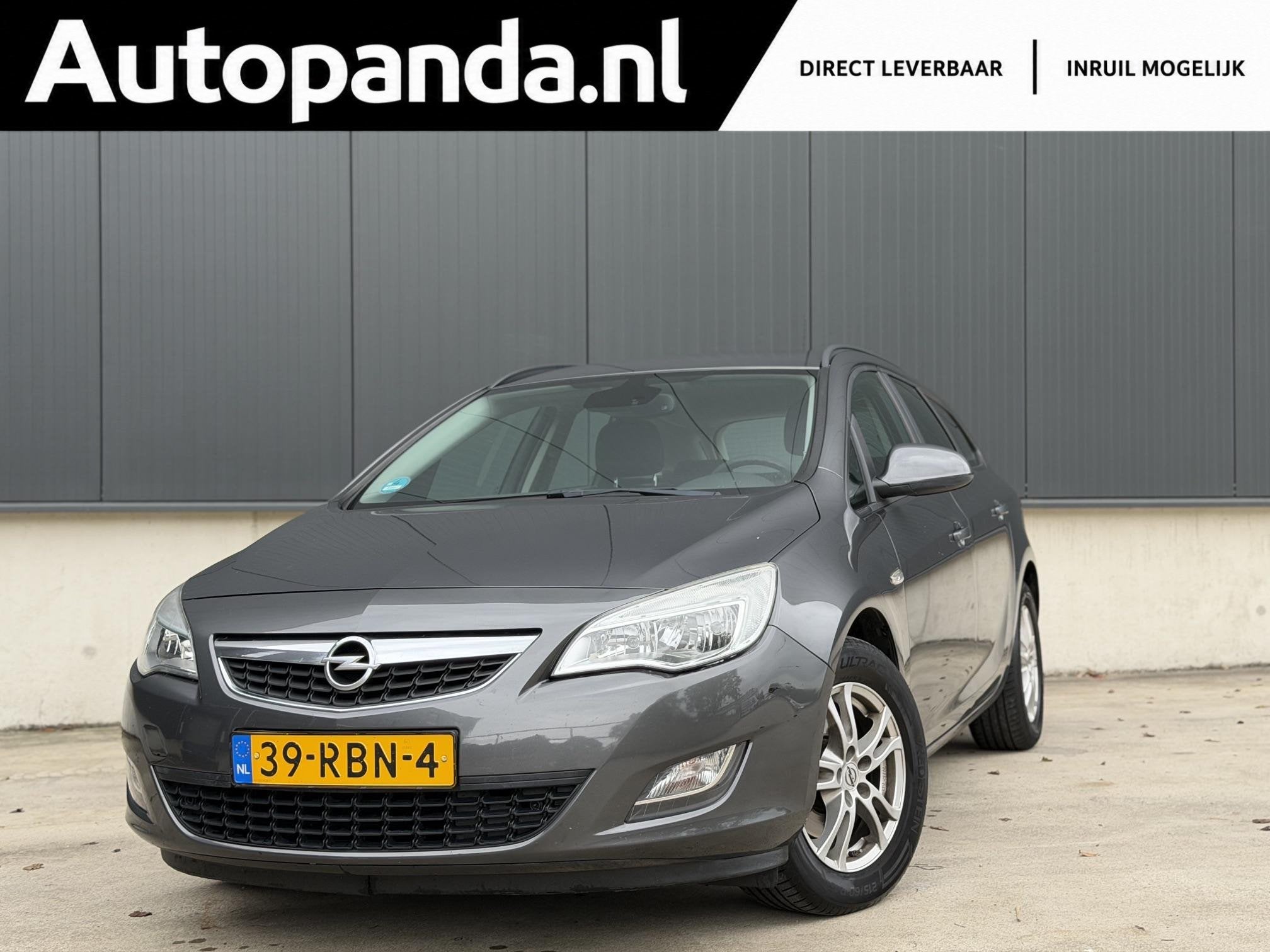 Opel Astra Sports Tourer 1.6 Turbo Cosmo l Trekhaak l Cruise, Auto's, Voorwielaandrijving, Euro 5, Gebruikt, Zwart