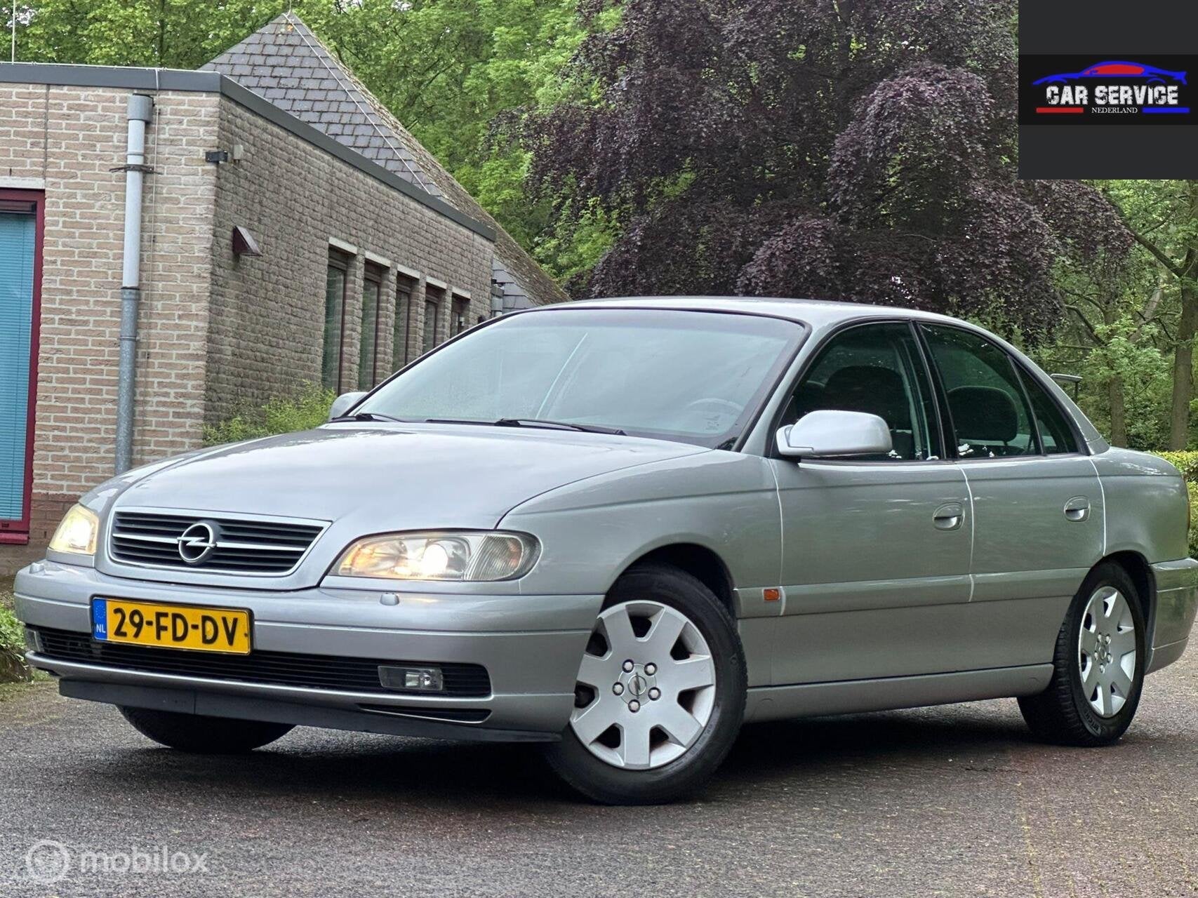 Opel Omega 2.2i-16V Sport/NAP/1e EIG/LMV/TREKHAAK/AUTOMAAT, Auto's, Omega, Gebruikt, 4 cilinders, Bedrijf