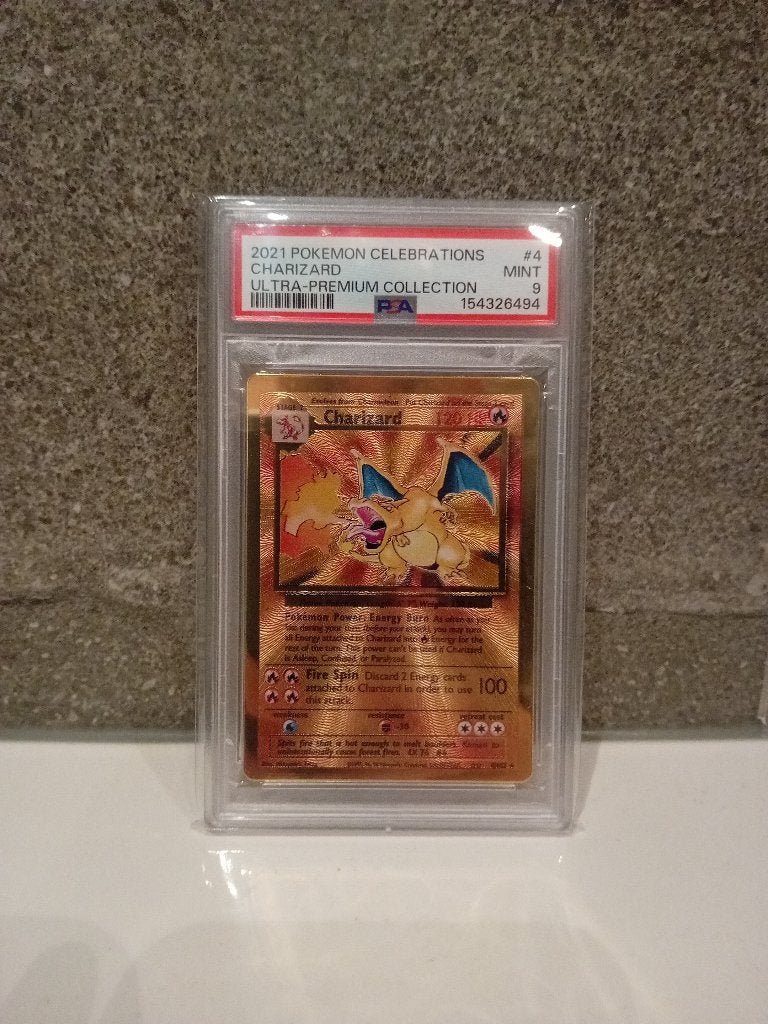 Charizard Gold Metal Card #4/102, Ophalen of Verzenden, Zo goed als nieuw, Losse kaart