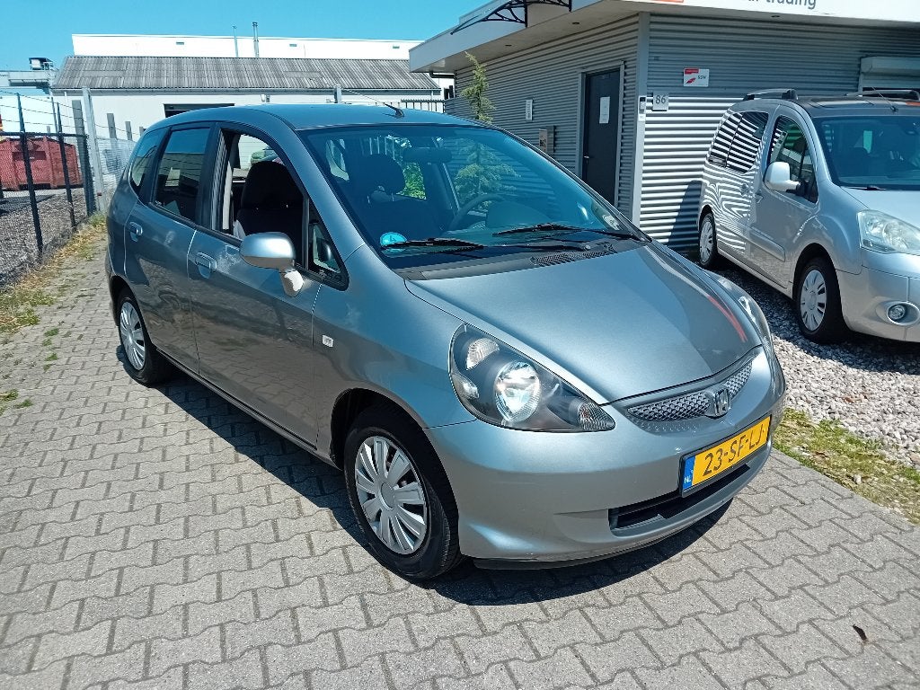 Honda Jazz 1.2 I 2005 Grijs 5 Deurs!! GOED ONDERHOUDEN AUTO!, Auto's, Voorwielaandrijving, 40 €/maand, 4 cilinders, Origineel Nederlands