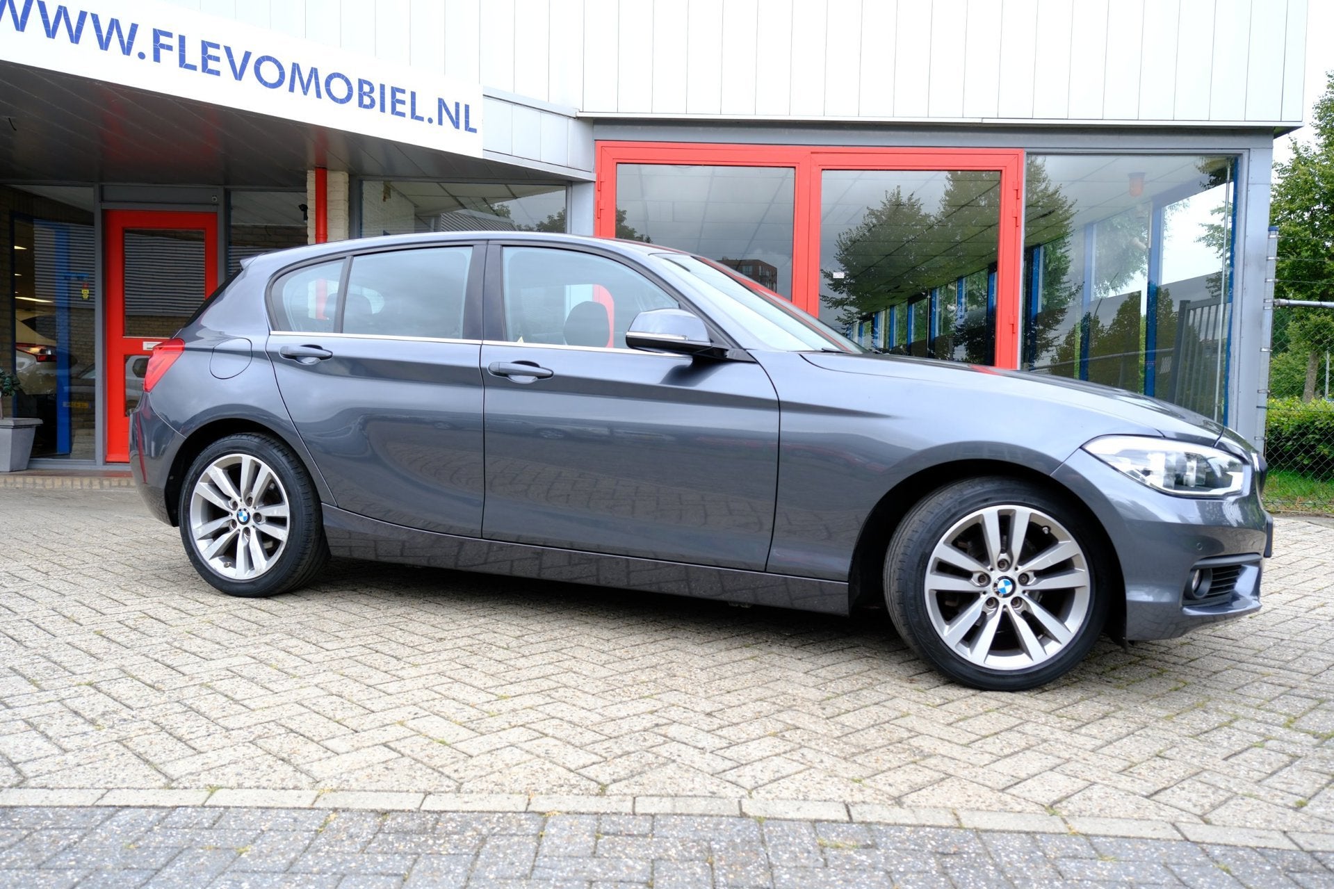 BMW 1-serie 118i Centennial Executive Aut. *37.360km!* Navi|, Auto's, Dealer onderhouden, Gebruikt, Origineel Nederlands, Bedrijf