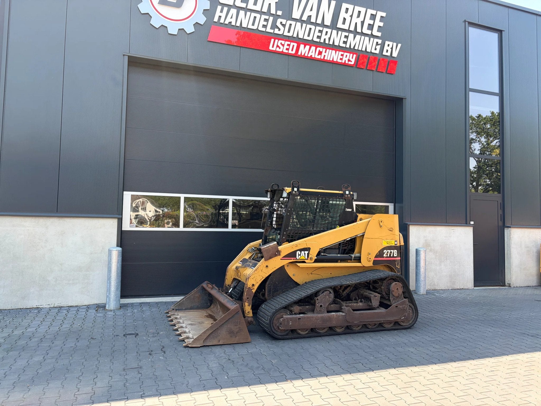 Caterpillar 277B rups schranklader (bj 2006), Wiellader of Shovel