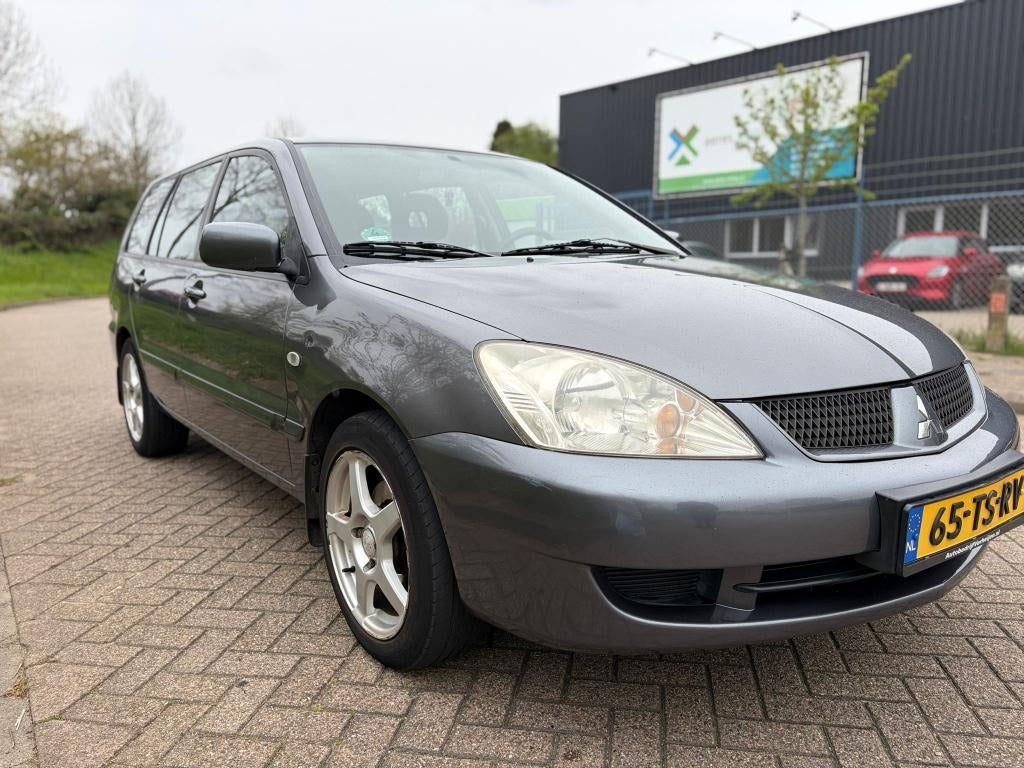 Mitsubishi Lancer 1.6 C Wagon 2007 Grijs €1250,00, Auto's, Voorwielaandrijving, Stof, 4 cilinders, 400 kg