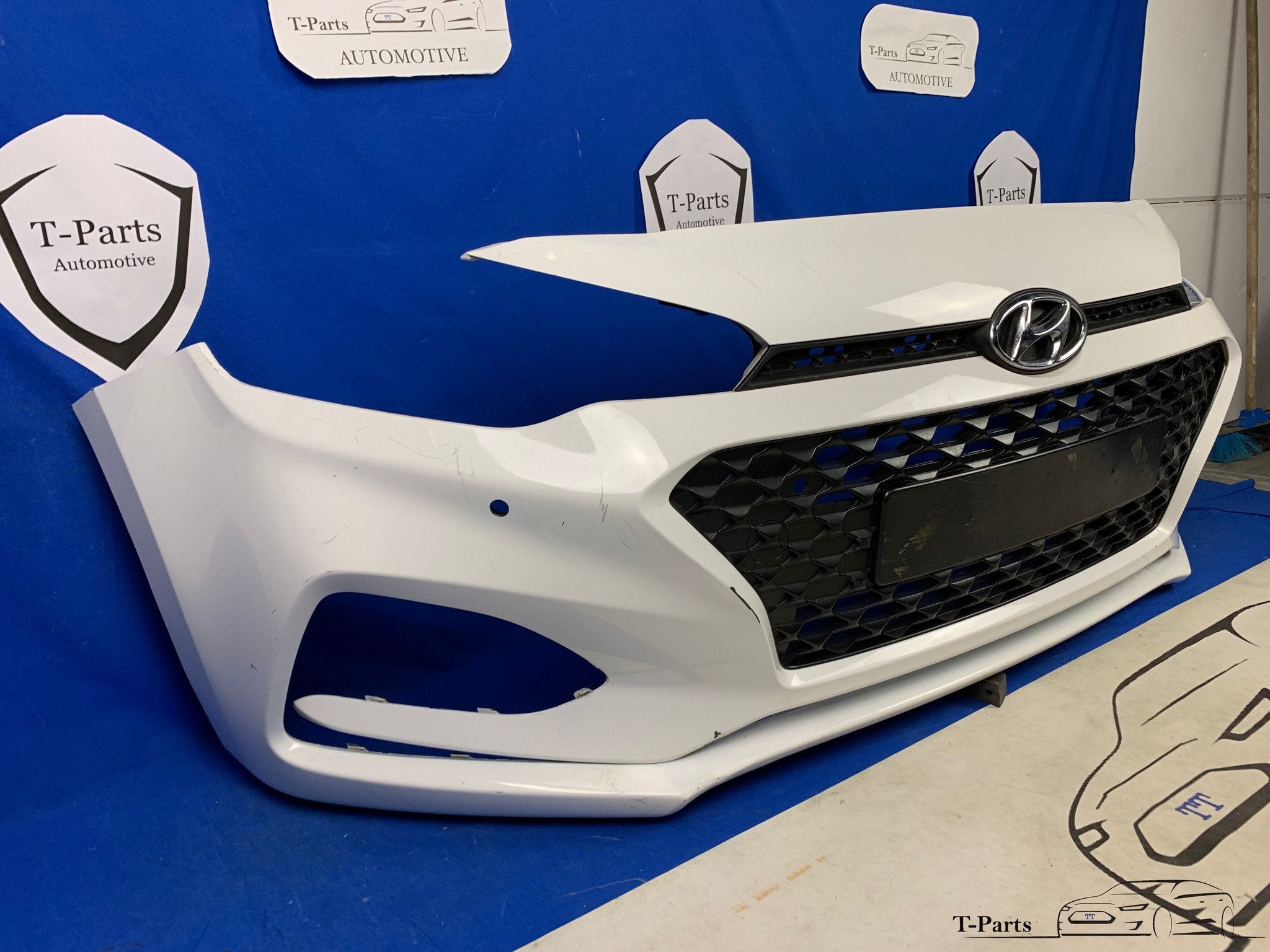 Hyundai i20 voorbumper bumper grille rooster PDC, Gebruikt, Heolleung-ro 12
06797  Seoul, Ophalen of Verzenden, Info@hyundai.com