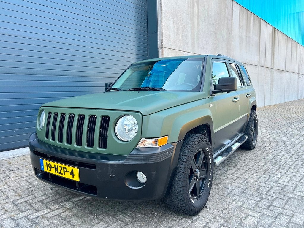 Jeep Patriot 2.4i Limited Liberty AUT LEDER CLIMA 4WD NAP, Auto's, Jeep, Automaat, Euro 5, 450 kg, Gebruikt