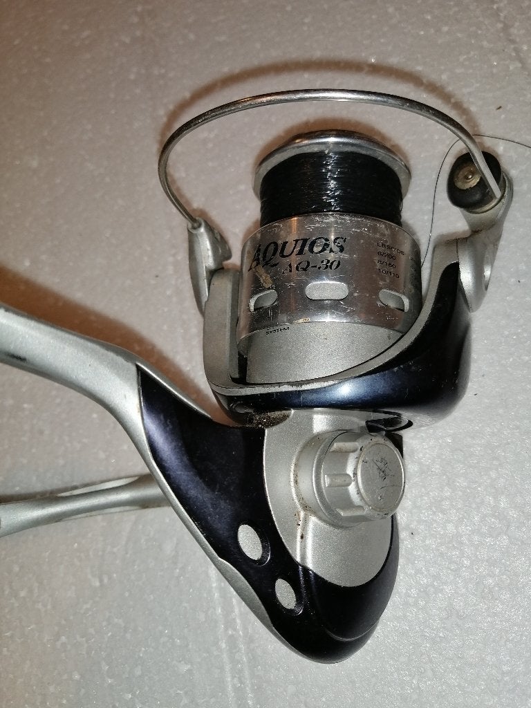 Vismolen Okuma Aquios AQ-30 met nylon lijn, Ophalen of Verzenden, Gebruikt, Molen