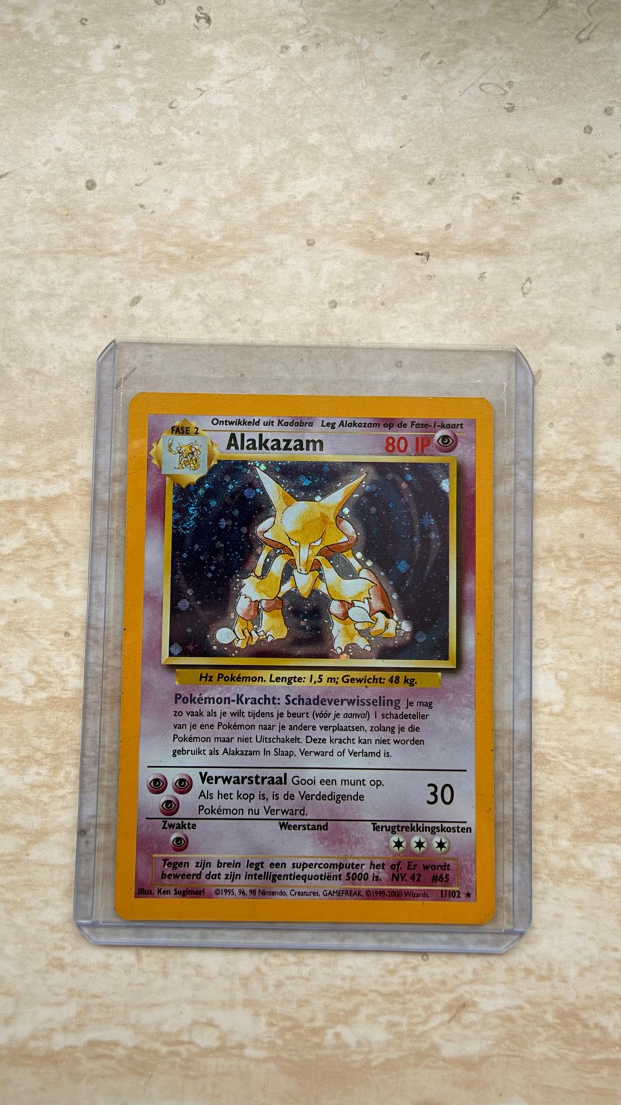 Alakazam 1/102 NL Pokémon kaart, Ophalen of Verzenden, Gebruikt, Losse kaart