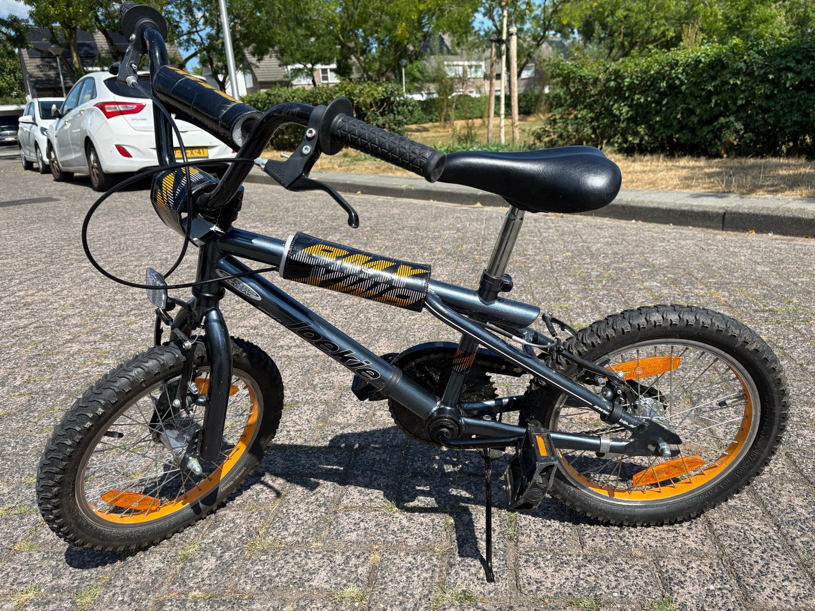 Loekie kinderfiets BMX 16 inch - Grijs/Oranje, Ophalen, Gebruikt, Terugtraprem, 16 tot 20 inch