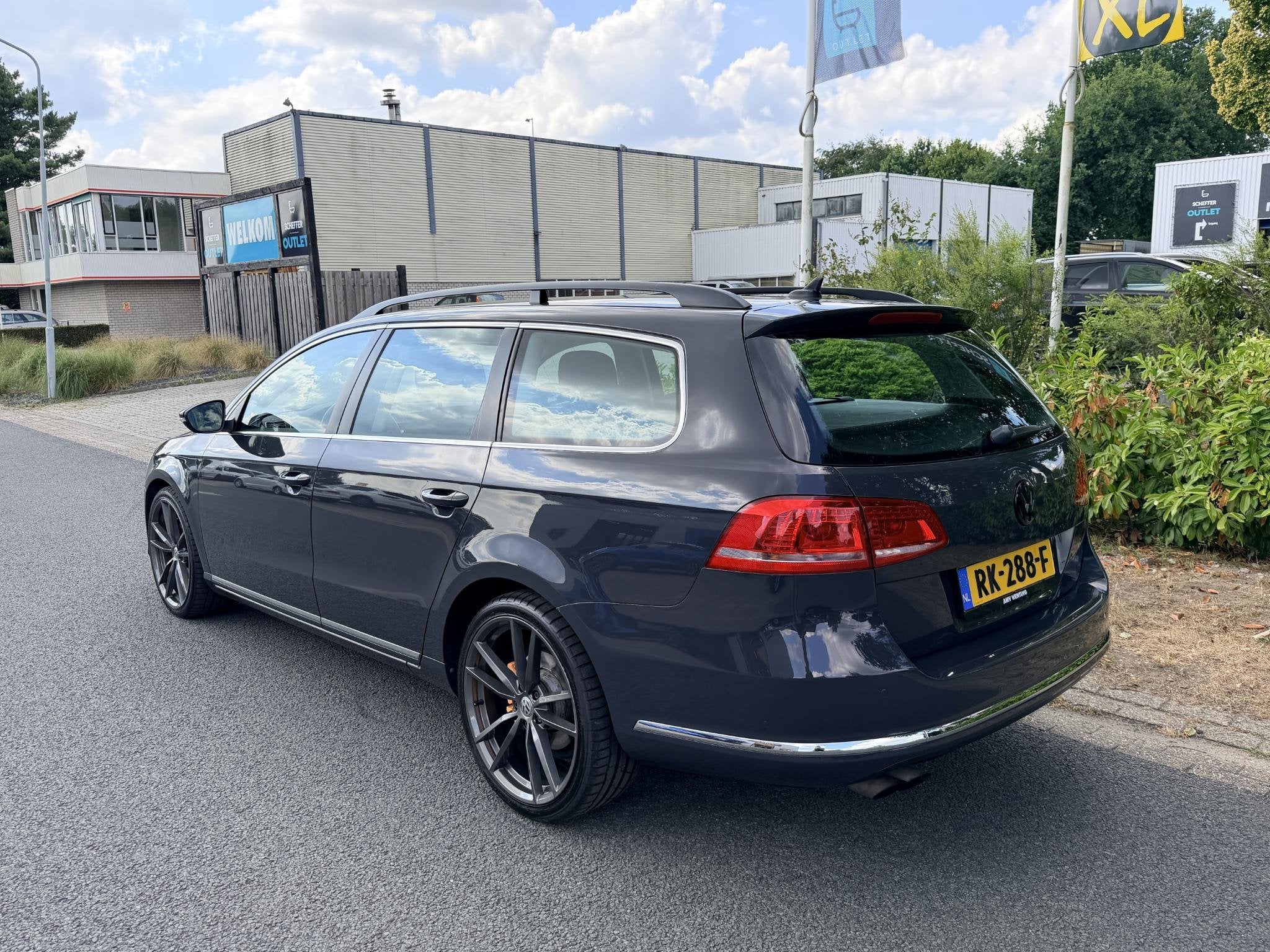 Volkswagen Passat Variant 2.0 TSI Highline 211PK DSG•Xenon, Auto's, Euro 5, Stof, Gebruikt, Zwart