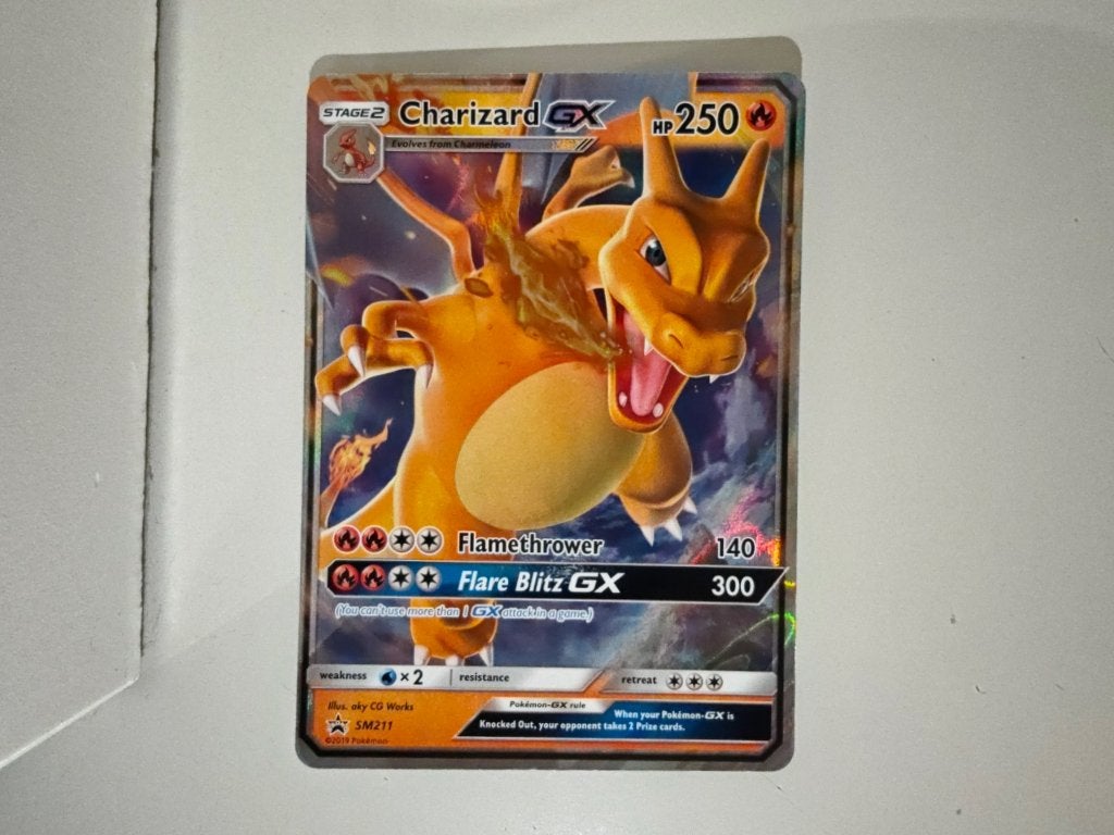 Charizard GX (SM 211), Ophalen of Verzenden, Zo goed als nieuw, Losse kaart, Foil