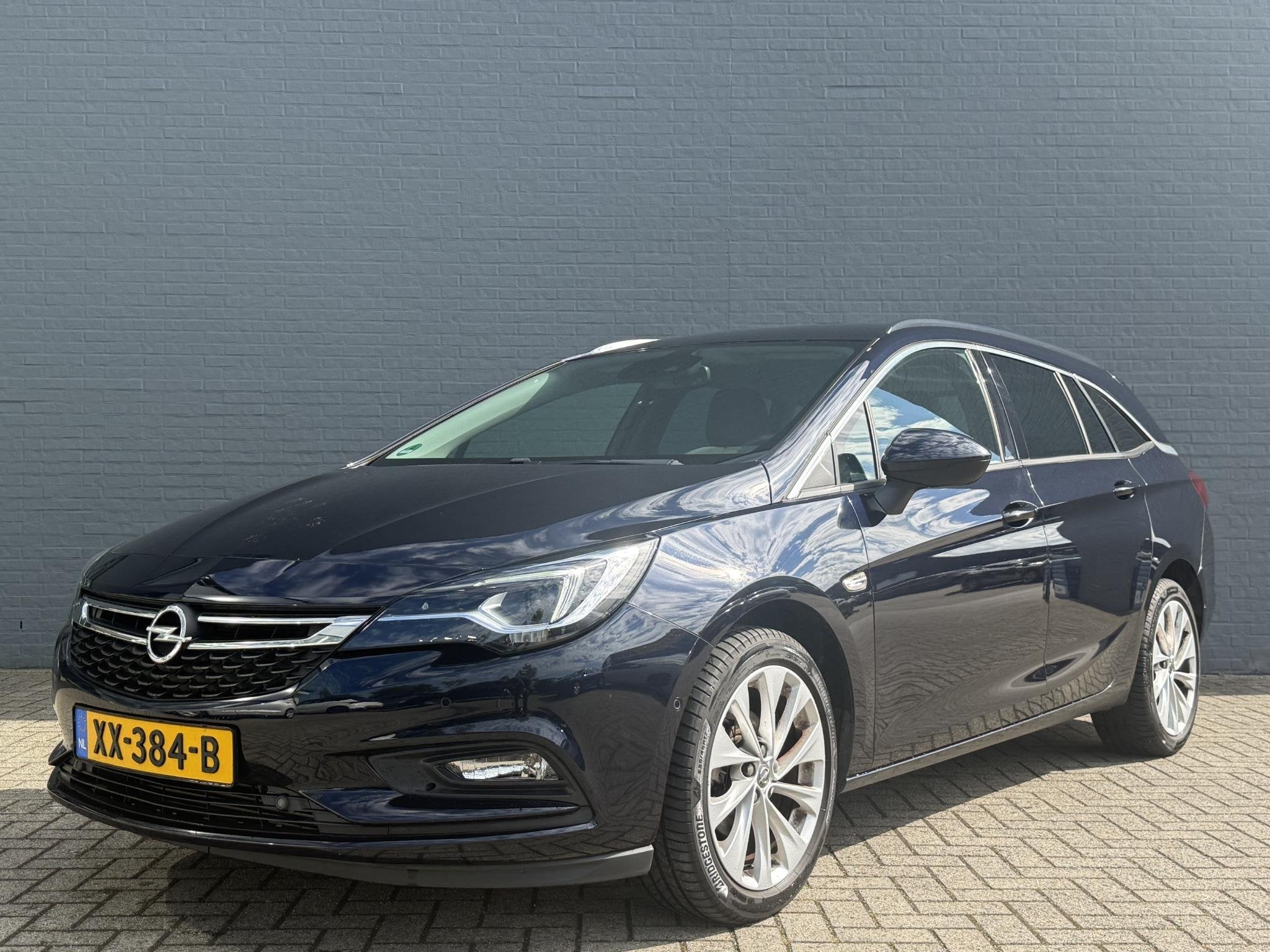 Opel Astra Sports Tourer 1.4 Innovation Navigatie | Stoelver, Auto's, Opel, Voorwielaandrijving, Gebruikt, 4 cilinders, 150 pk