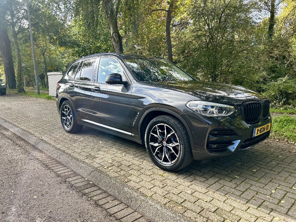 BMW X3 Xdrive30e 292pk Aut 2020 Sophistograu Plug-in Hybride, Automaat, 1998 cc, Stof, Zwart