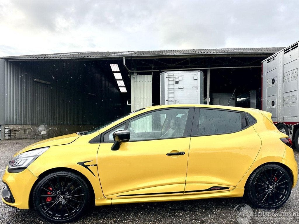 Renault Clio Gereserveerd RS Trophy 1.6 Turbo aut + F1 290pk, Auto diversen, Schadeauto's, Automaat, 1618 cc, Renault, Geel