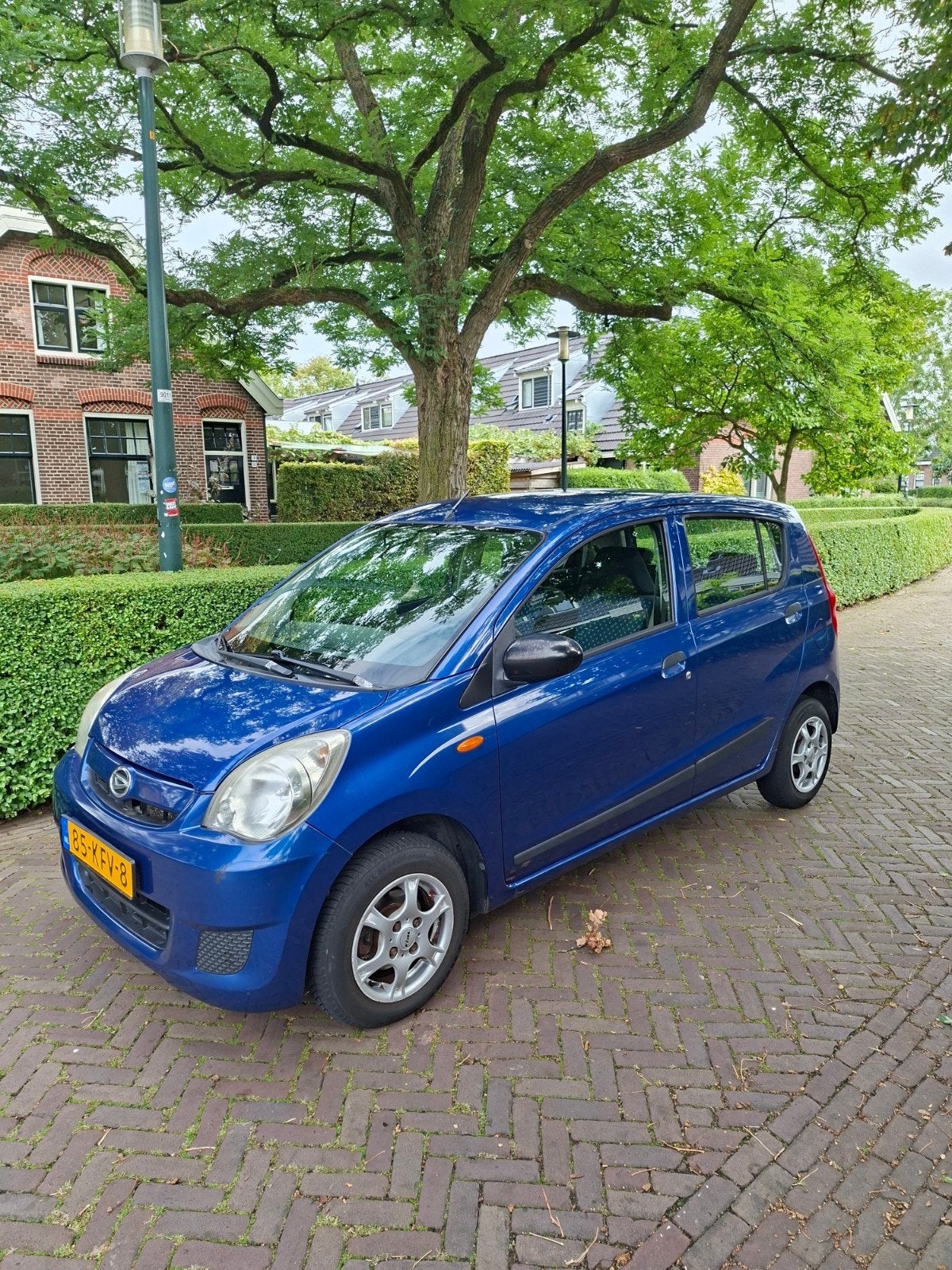 Daihatsu Cuore 1.0 5D 2009 Blauw met nieuwe APK., Voorwielaandrijving, Stof, 600 kg, 18 €/maand