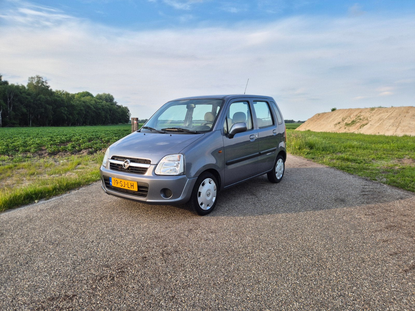 Opel Agila 1.2 16V Twinport 2006 Grijs, Auto's, Opel, Voorwielaandrijving, 40 €/maand, 4 cilinders, 1229 cc