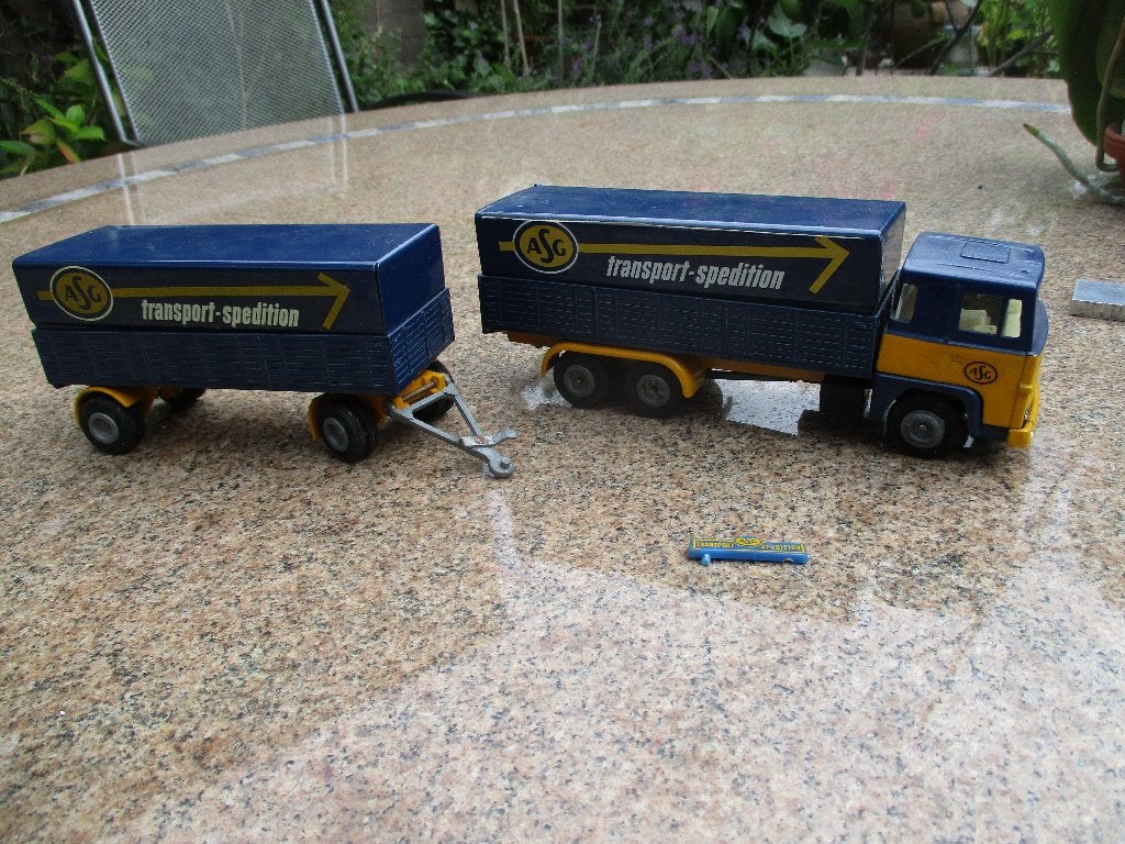 Tekno Scania 140 huifcombi ASG, Hobby en Vrije tijd, Modelauto's | 1:50, Verzenden, Gebruikt, Bus of Vrachtwagen, Tekno
