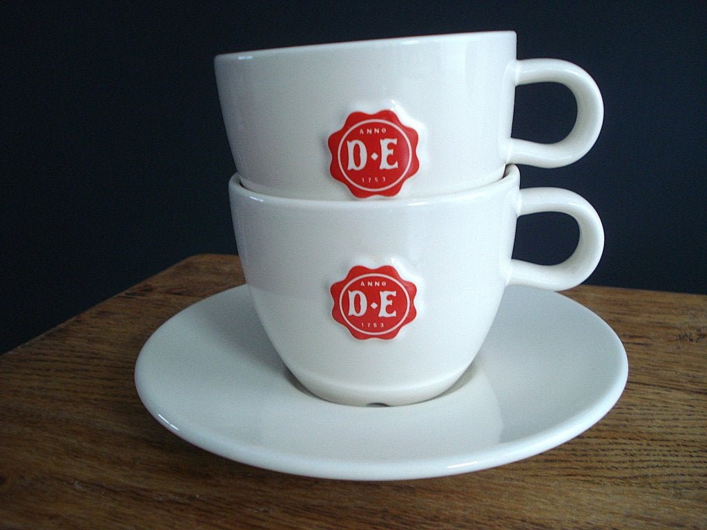 DE Douwe Egberts koffie 2x kop en 1x schotel, Ophalen of Verzenden, Zo goed als nieuw, Overige stijlen, Kop(pen) en/of Schotel(s)