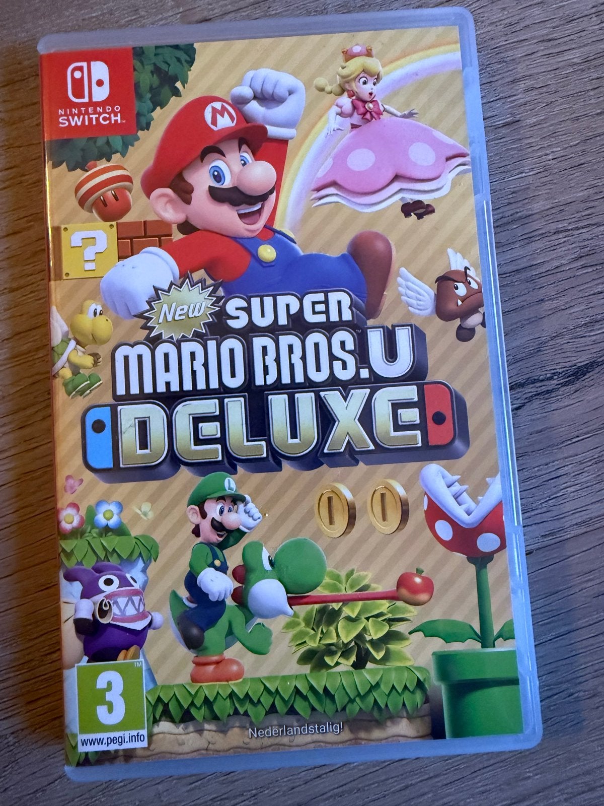 New Super Mario Bros. U Deluxe - Nintendo Switch, Spelcomputers en Games, Games | Nintendo Switch, Zo goed als nieuw, Platform
