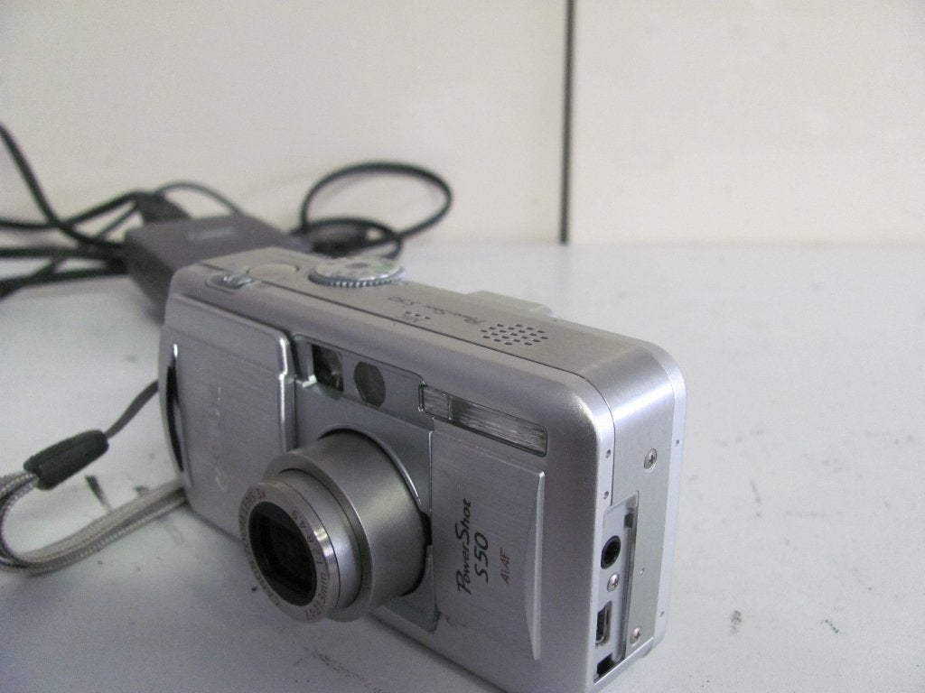 Canon PowerShot s50 aiaf met accu en lader, Audio, Tv en Foto, Fotocamera's Digitaal, Gebruikt, Canon, Compact, Ophalen of Verzenden