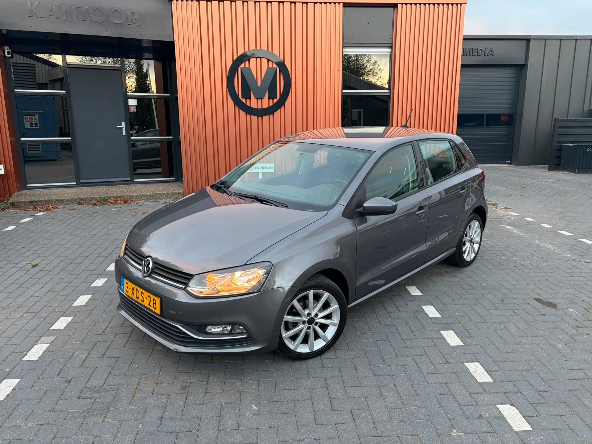 Volkswagen Polo 1.2 TSI Comfortline Automaat/Cruise/PDC, Auto's, Stof, Euro 6, 4 cilinders, Verwarmde buitenspiegels