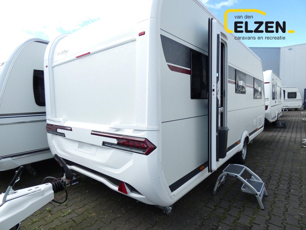 Hobby De Luxe 540 KMFE Model 2027, Caravans en Kamperen, Serviceluik, Dwars-stapelbed, Hobby, Bedrijf