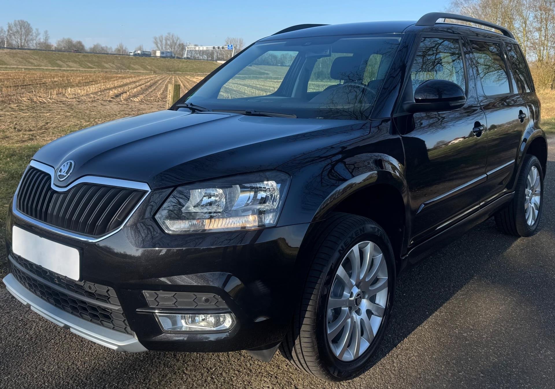 Skoda Yeti 1.4 TSI Ambition 2014 AUTOMAAT CLIMA NAVI CRUISE, Auto's, Skoda, Euro 5, Gebruikt, Zwart, 4 cilinders