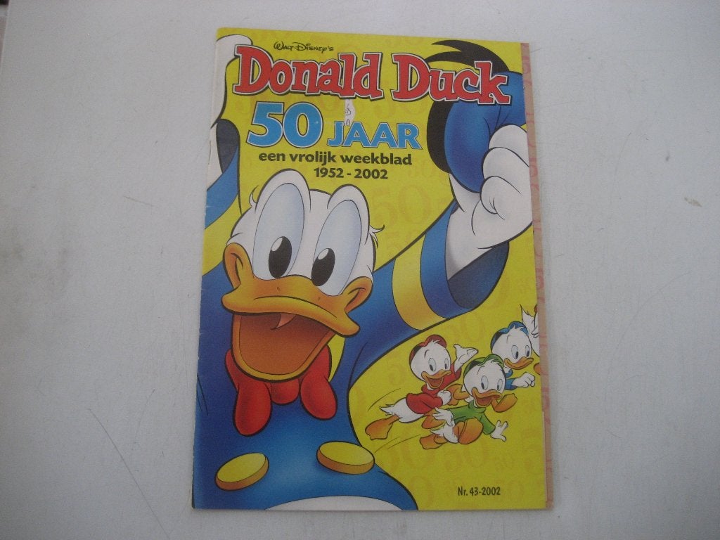 donald duck 50 jaar, Eén stripboek, Ophalen of Verzenden, Gelezen