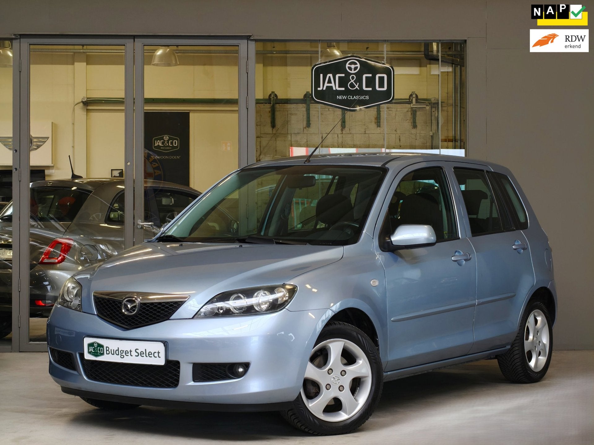 Mazda 2 1.4 Touring Airco NAP, Auto's, Dealer onderhouden, Stof, Zwart, 4 cilinders