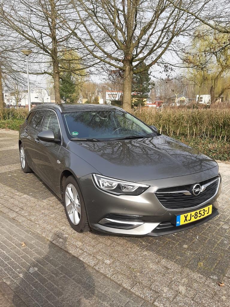 Opel Insignia 1.5 Turbo 165pk Start/stop Aut 2019 Grijs, Auto's, 730 kg, 164 pk, 4 cilinders, Leder en Stof