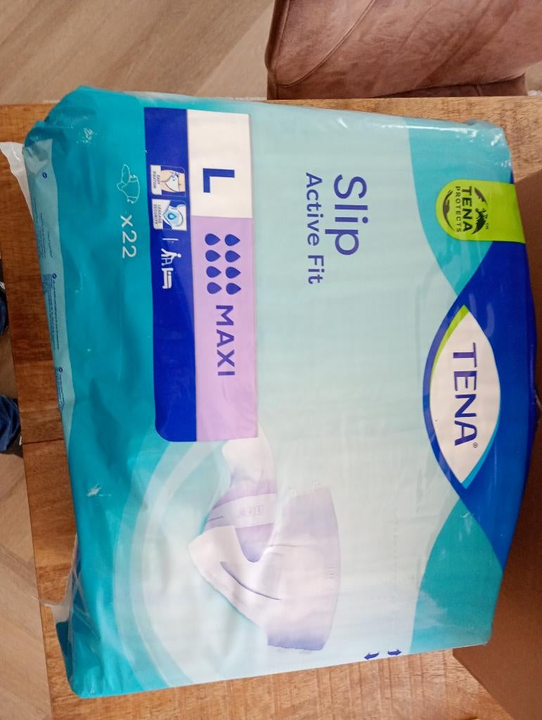Tena slip active fit mt L aangebroken, Ophalen, Zo goed als nieuw