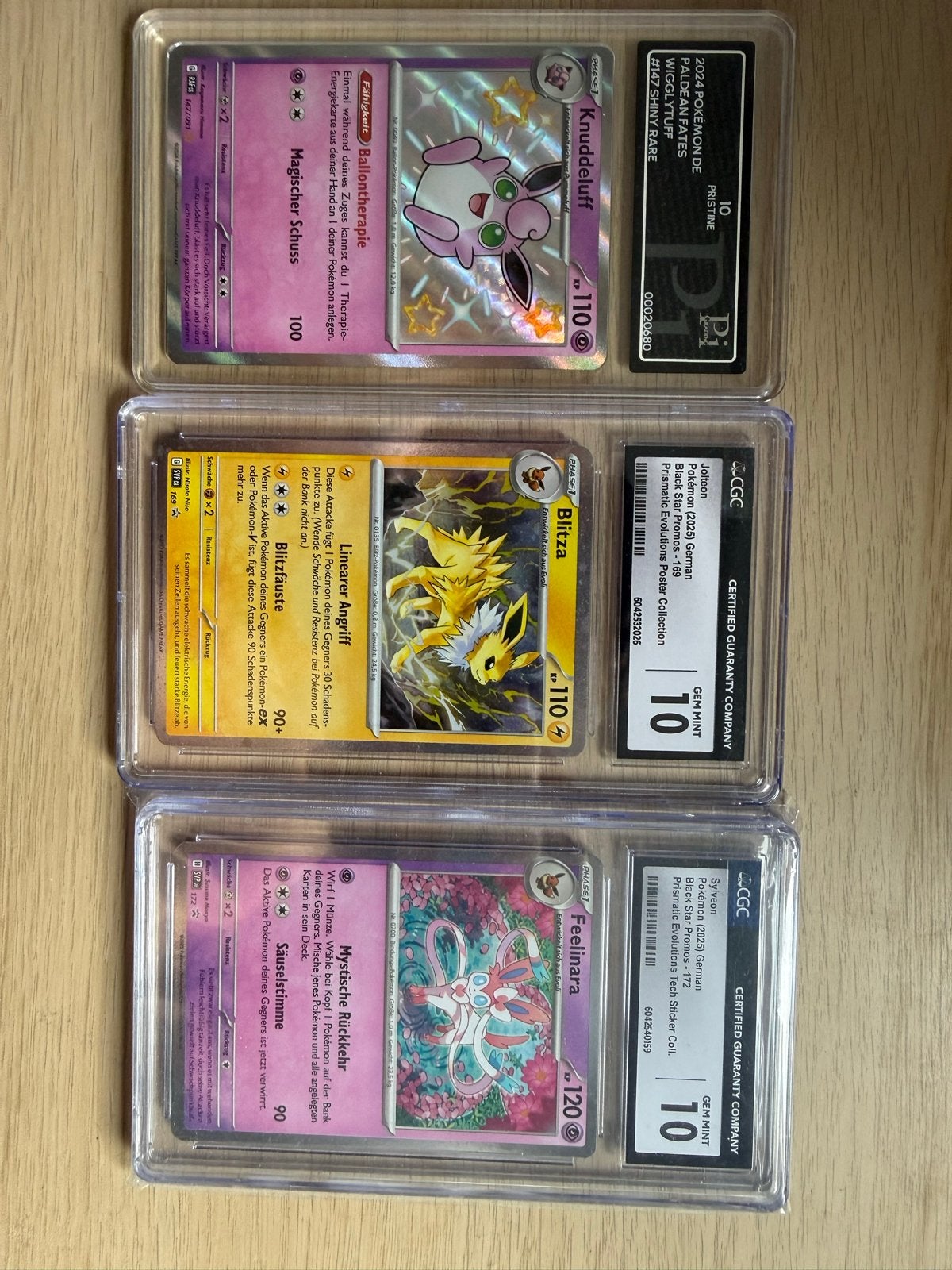 Duitse Graded Pokémon Kaarten - Knudeluff, Blitza, Feelinara, Ophalen of Verzenden, Zo goed als nieuw, Meerdere kaarten