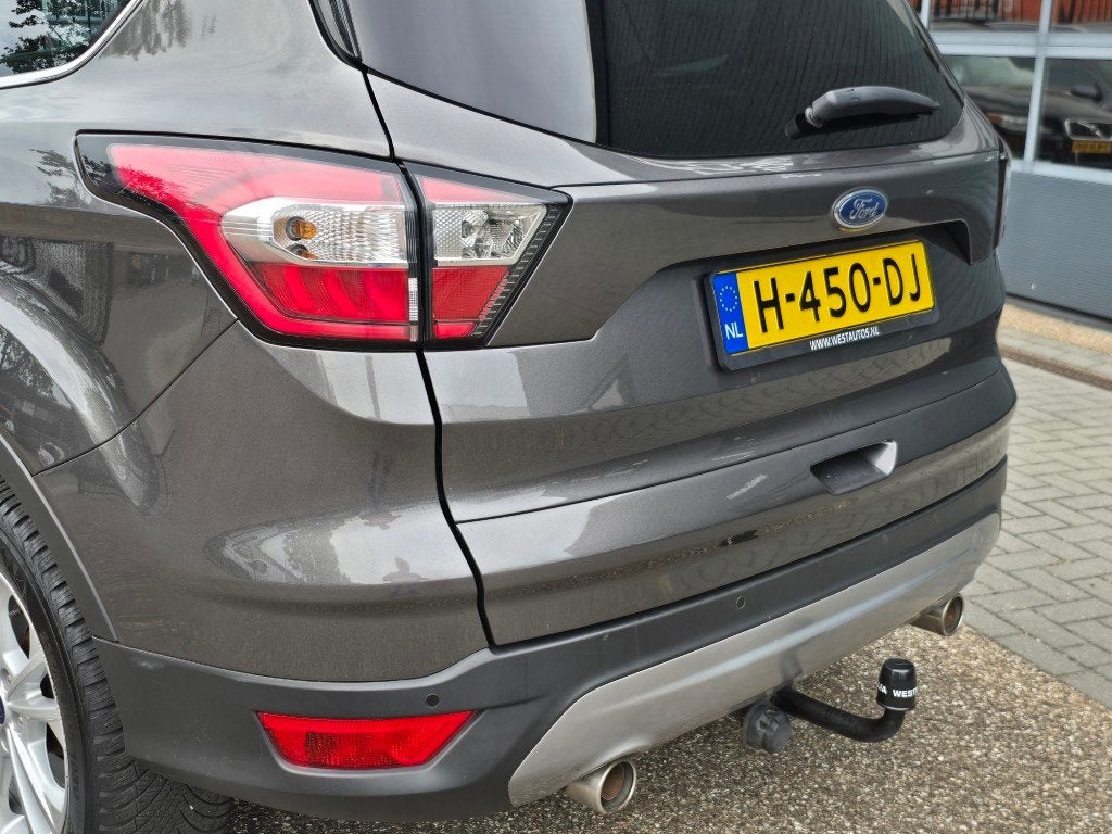 Foto 10 van Ford Kuga 1.5 EcoBoost Titanium D-Riem vervangen mooie auto