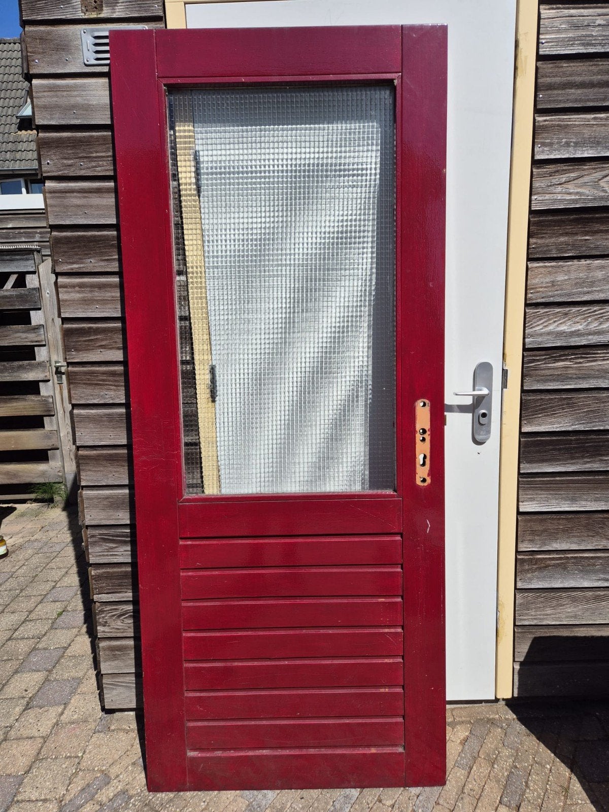 Merbau schuurdeur 88x211,5 cm met glas, Doe-het-zelf en Verbouw, Deuren en Horren, Ophalen, Gebruikt, 80 tot 100 cm, Buitendeur