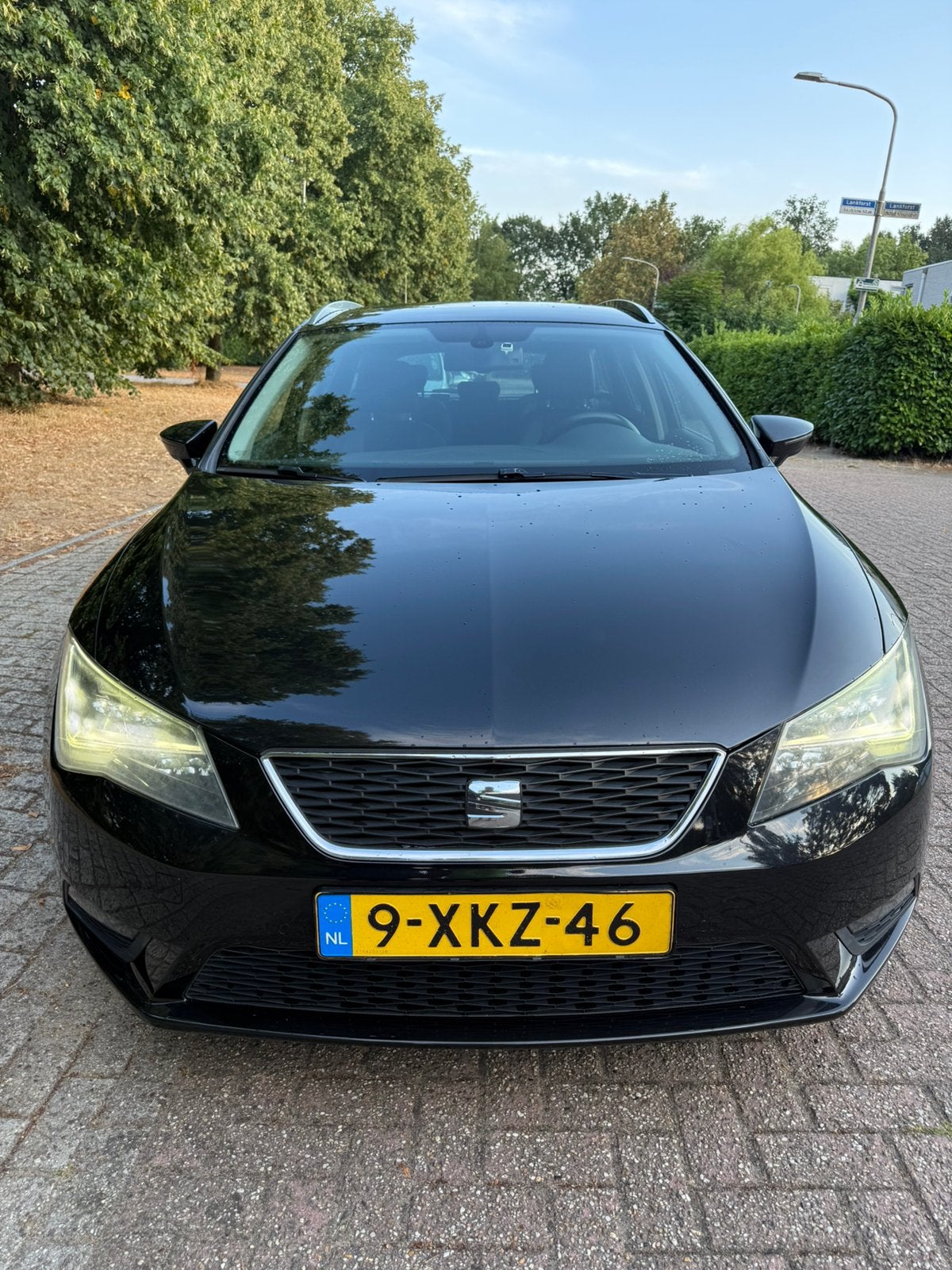Seat Leon 1.6 TDI 110pk 2014 Zwart, Auto's, Voorwielaandrijving, Euro 5, Zwart, 4 cilinders
