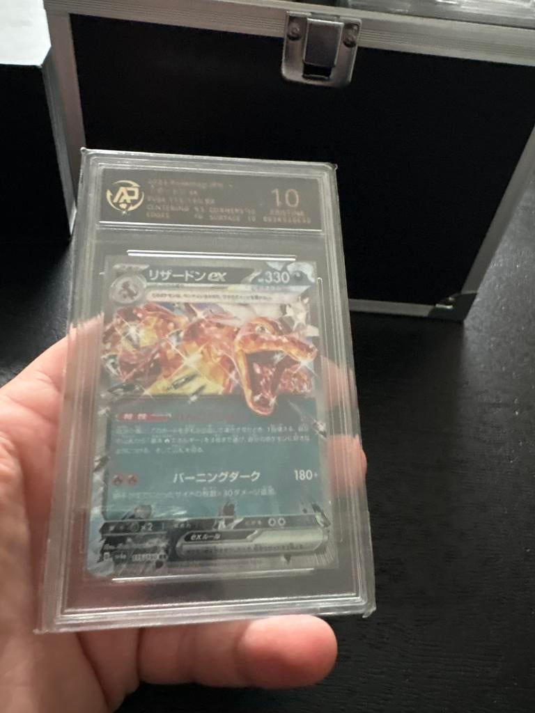 Charizard ex pristine 10, Ophalen of Verzenden, Zo goed als nieuw, Meerdere kaarten, Foil