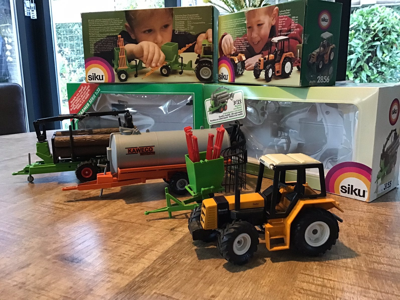 SIKU FARMER SERIE TREKKER MET MACHINES, Ophalen of Verzenden, Zo goed als nieuw, Tractor of Landbouw, SIKU