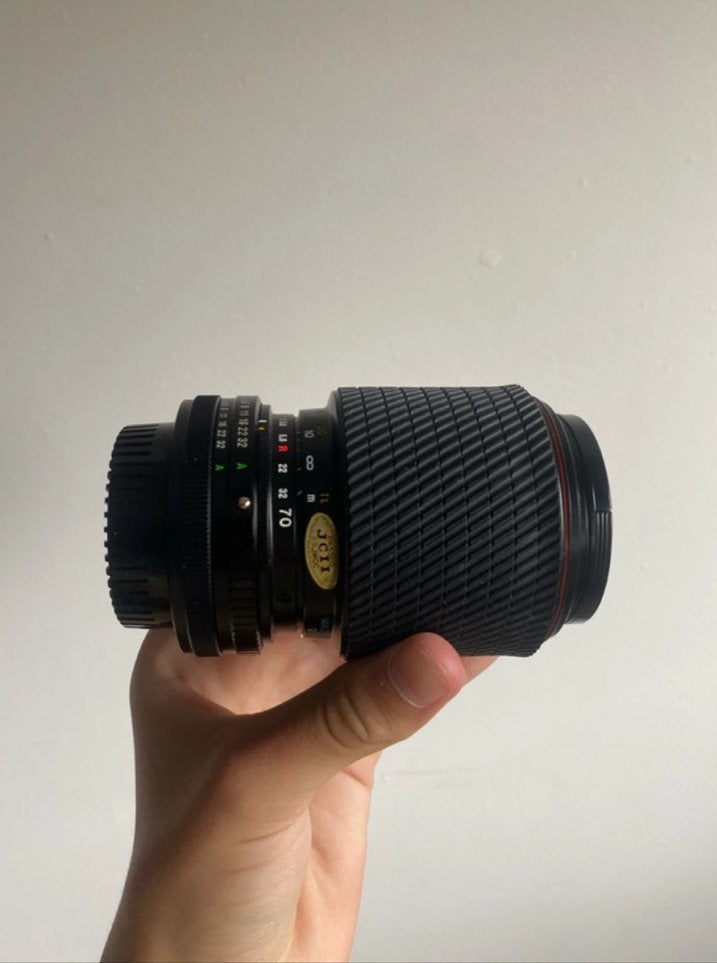 Tokina 70-210mm f/4-5.6 Vintage Zoomlens - Canon FD, Ophalen of Verzenden, Zo goed als nieuw, Batterij
