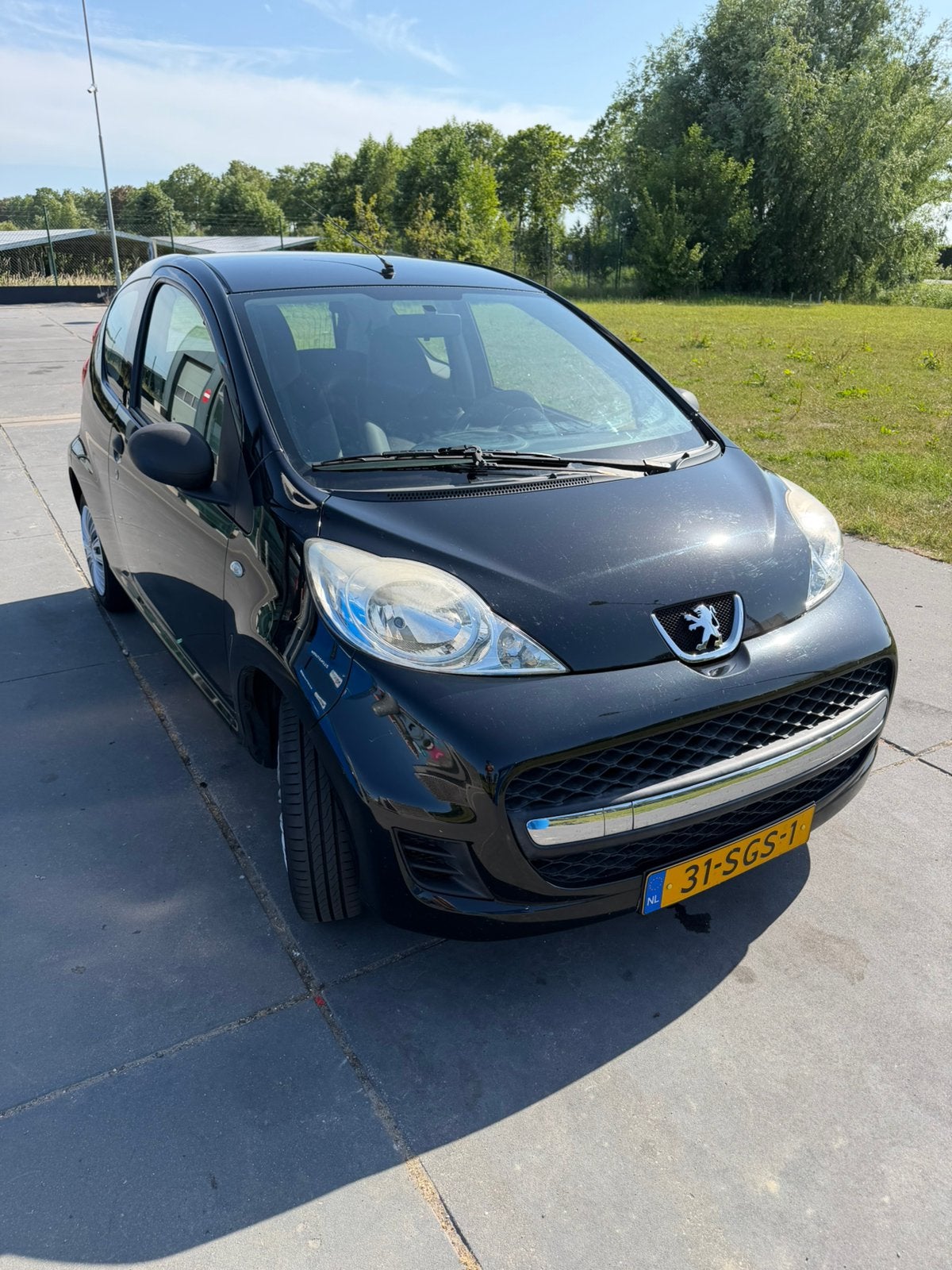 Peugeot 107 1.0 12V E-vti 68PK 3DR 2011 Zwart, Voorwielaandrijving, 4 stoelen, Origineel Nederlands, Handgeschakeld