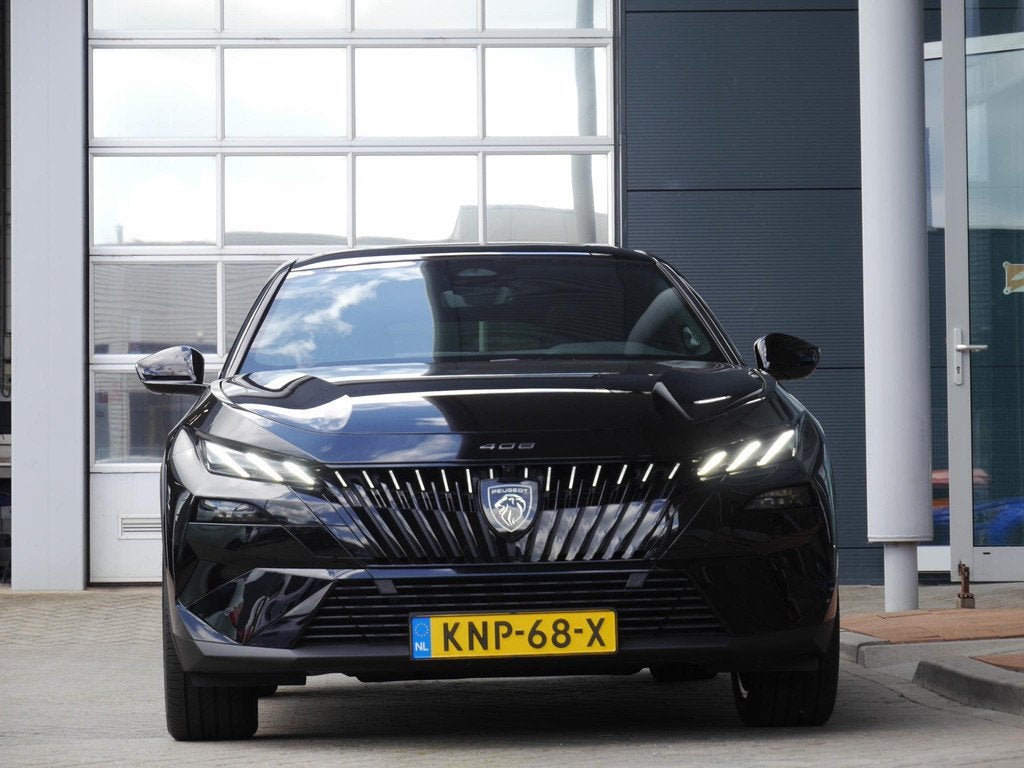 Peugeot e-408 GT 58 kWh | Stoel en stuurverwarming | Panoram, Auto's, 213 pk, Zwart, Origineel Nederlands, Nieuw