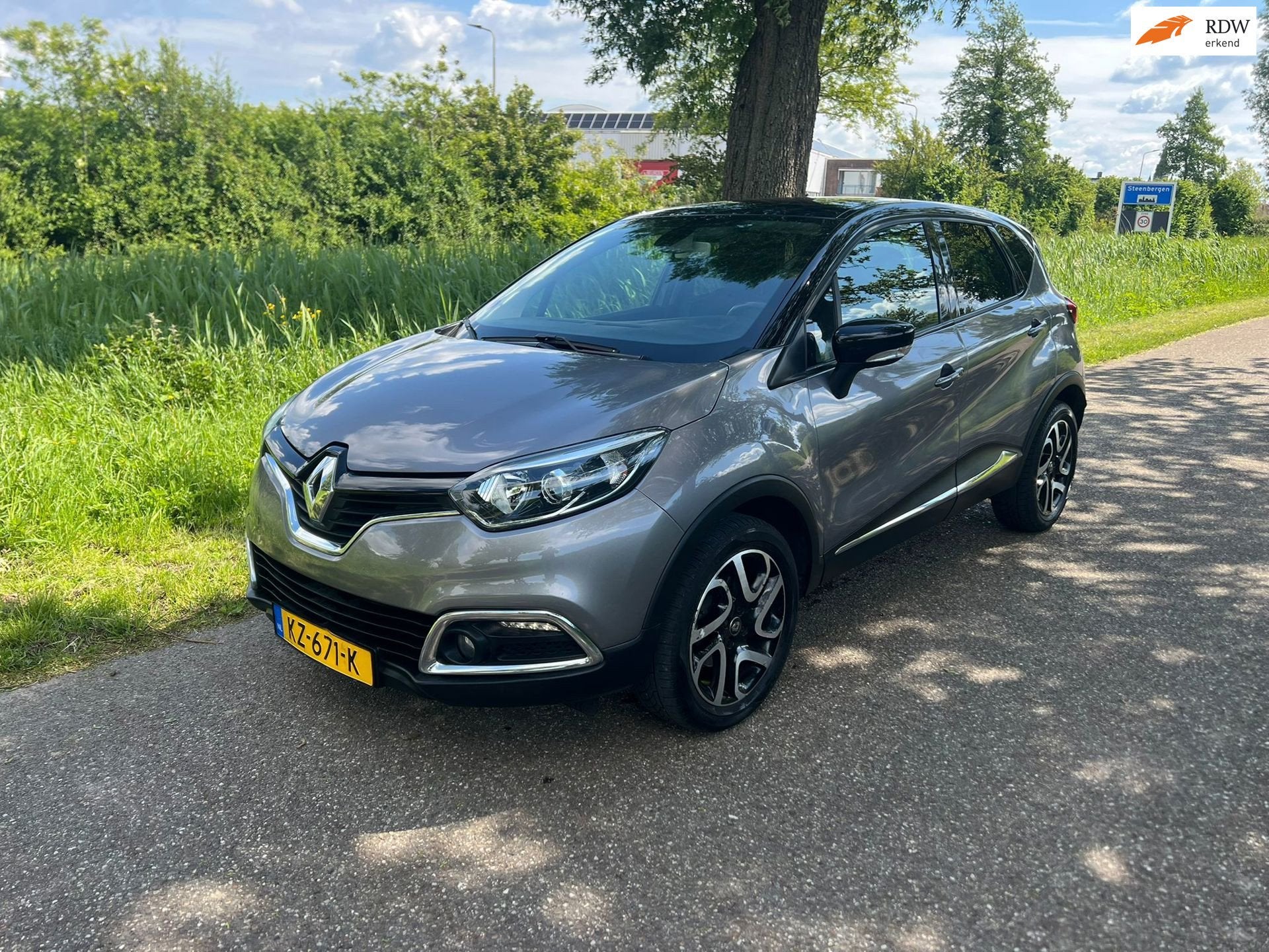 Renault Captur 1.2 TCe Dynamique Automaat 1e Eigenaar Cruise, Auto's, Dealer onderhouden, Stof, 4 cilinders, Verwarmde buitenspiegels