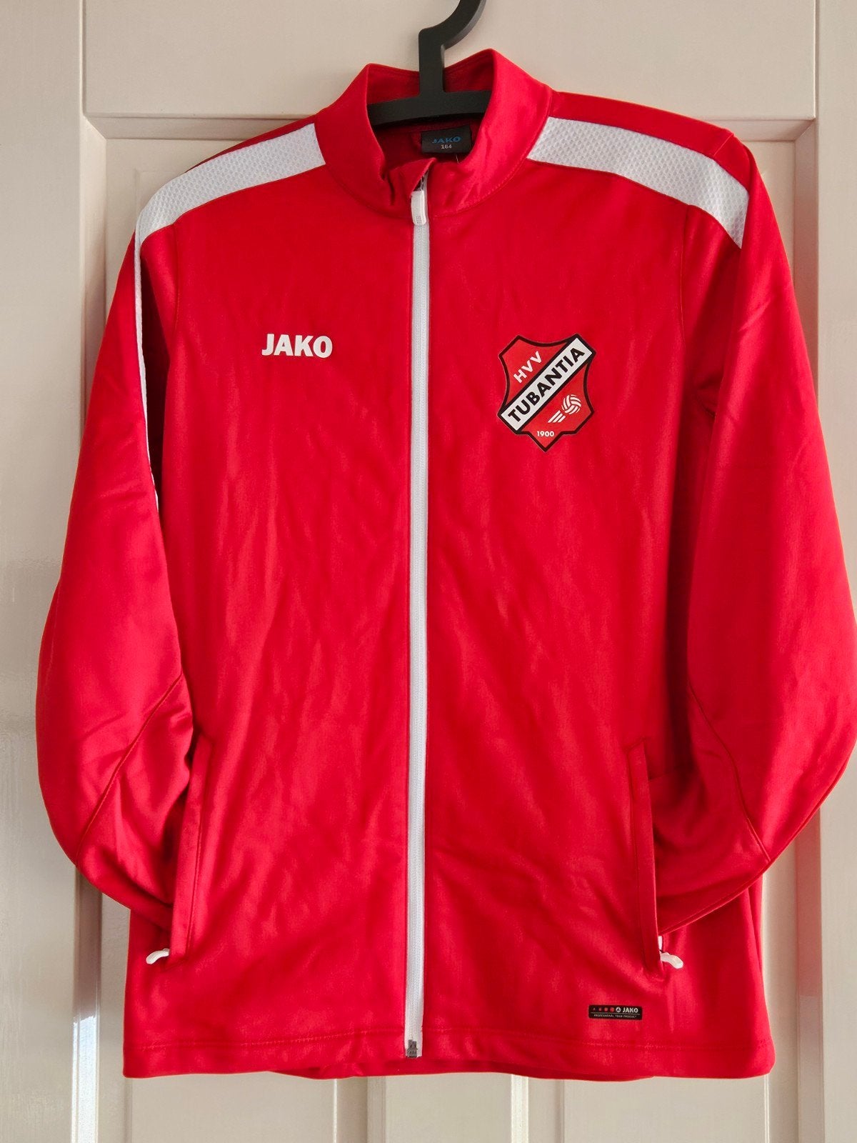 Nieuw! Jako trainingspak HVV Tubantia - Maat 164, Ophalen, Zo goed als nieuw, Voetbal, Jako