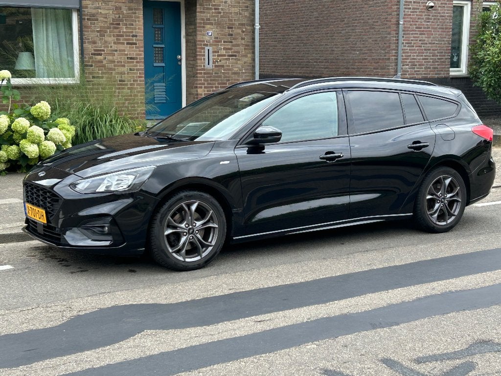 Ford Focus 1.0 Ecoboost ST-line Hybrid 155pk 2021 Zwart, Auto's, Stof, 1288 kg, Zwart, Stationwagon
