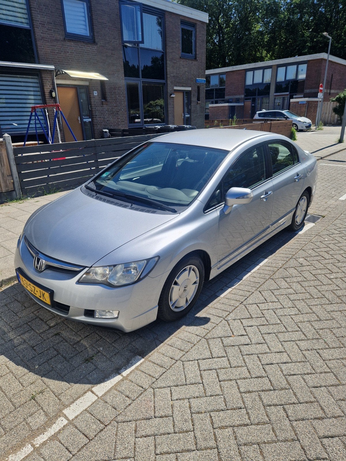 Honda Civic 1.3 Vtec Hybrid 4DR C-tr. 2006 Grijs, Auto's, Origineel Nederlands, Hybride Elektrisch/Benzine, 22 km/l, Sedan