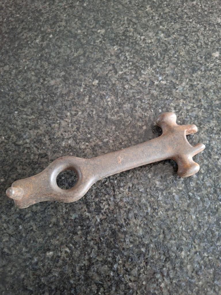 Vintage opener voor potkachel, Ophalen
