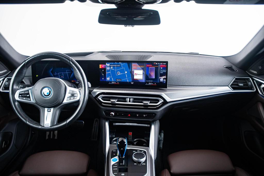 BMW i4 eDrive40 84 kWh M Sport pro - Active cruise control -, 12 maanden, Achterwielaandrijving, 590 km, Blauw