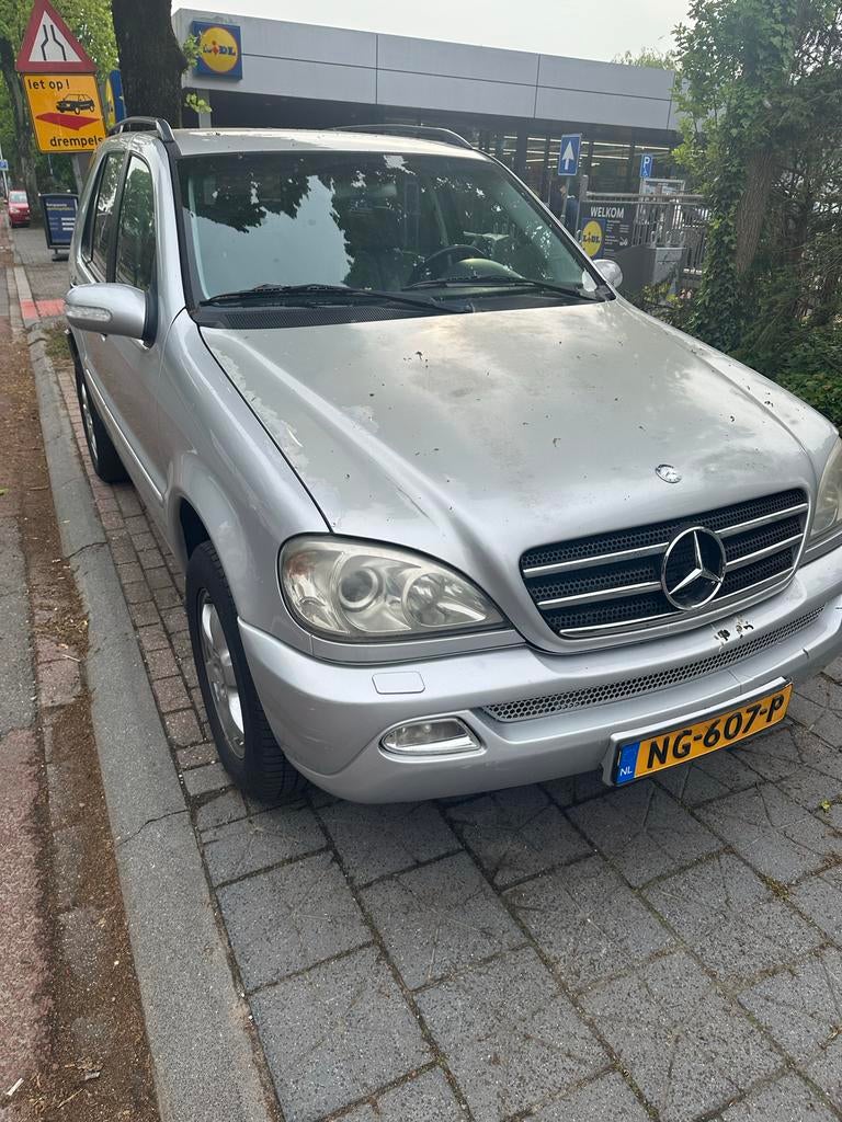 Mercedes-Benz M-klasse Grijs, 23 km/l, Stationwagon, Diesel, Particulier