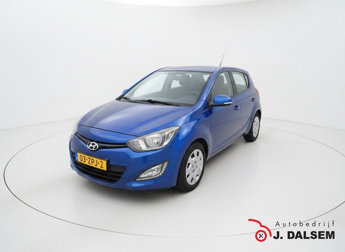 Hyundai i20 1.2i i-Motion (bj 2013), Auto's, Euro 5, 31 €/maand, 4 cilinders, Blauw